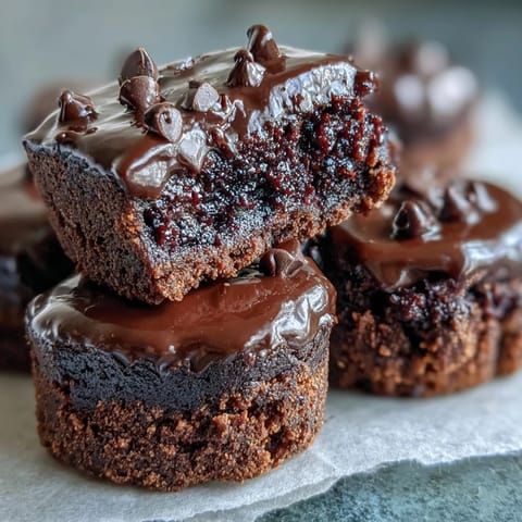 Fudgy Fiber-Maxxing Bean Brownie Bites, decadent chocolate treats cooling on a rack.